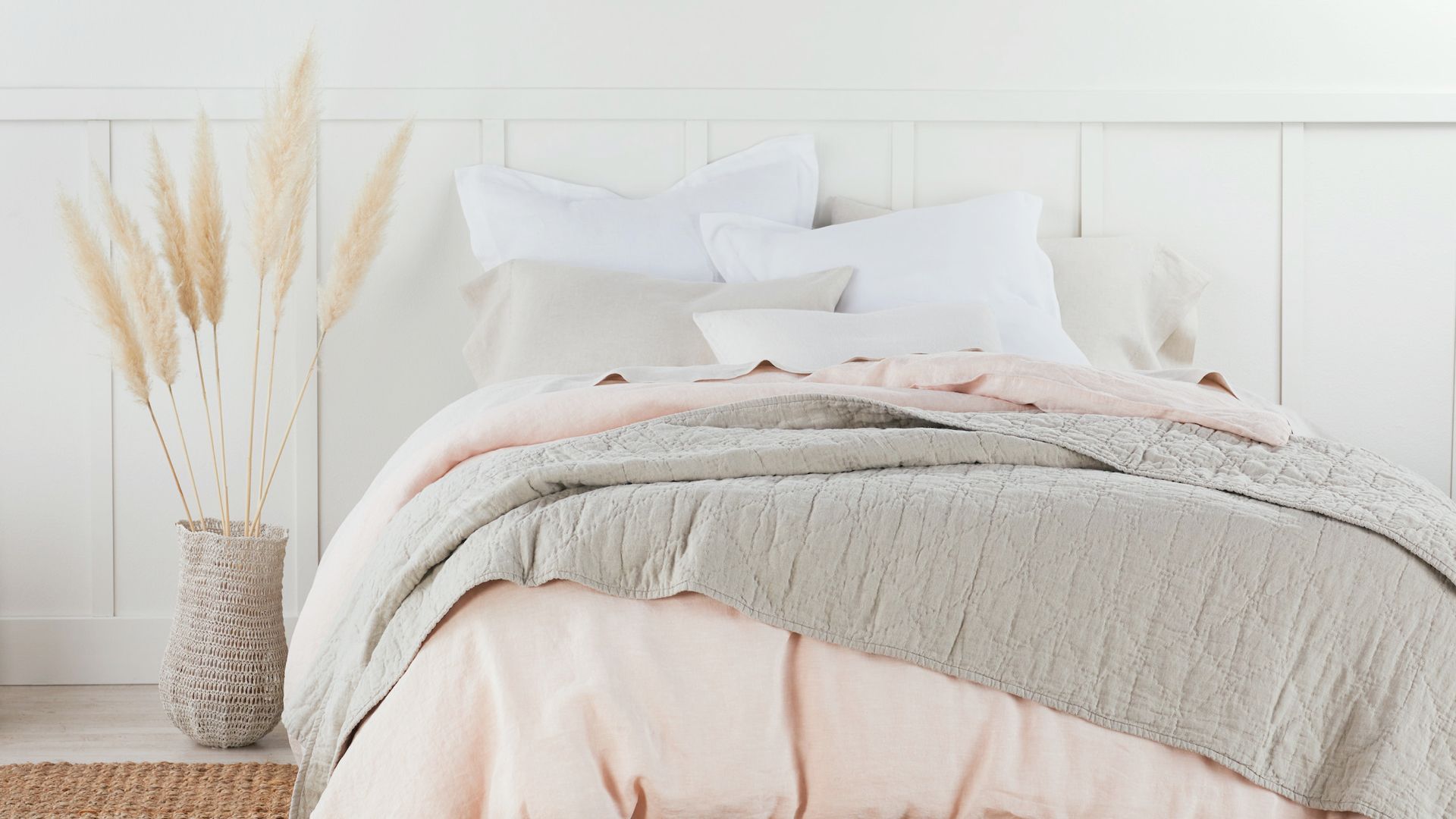 a Cozy Coyuchi Bed Setup with Neutral-toned Linens