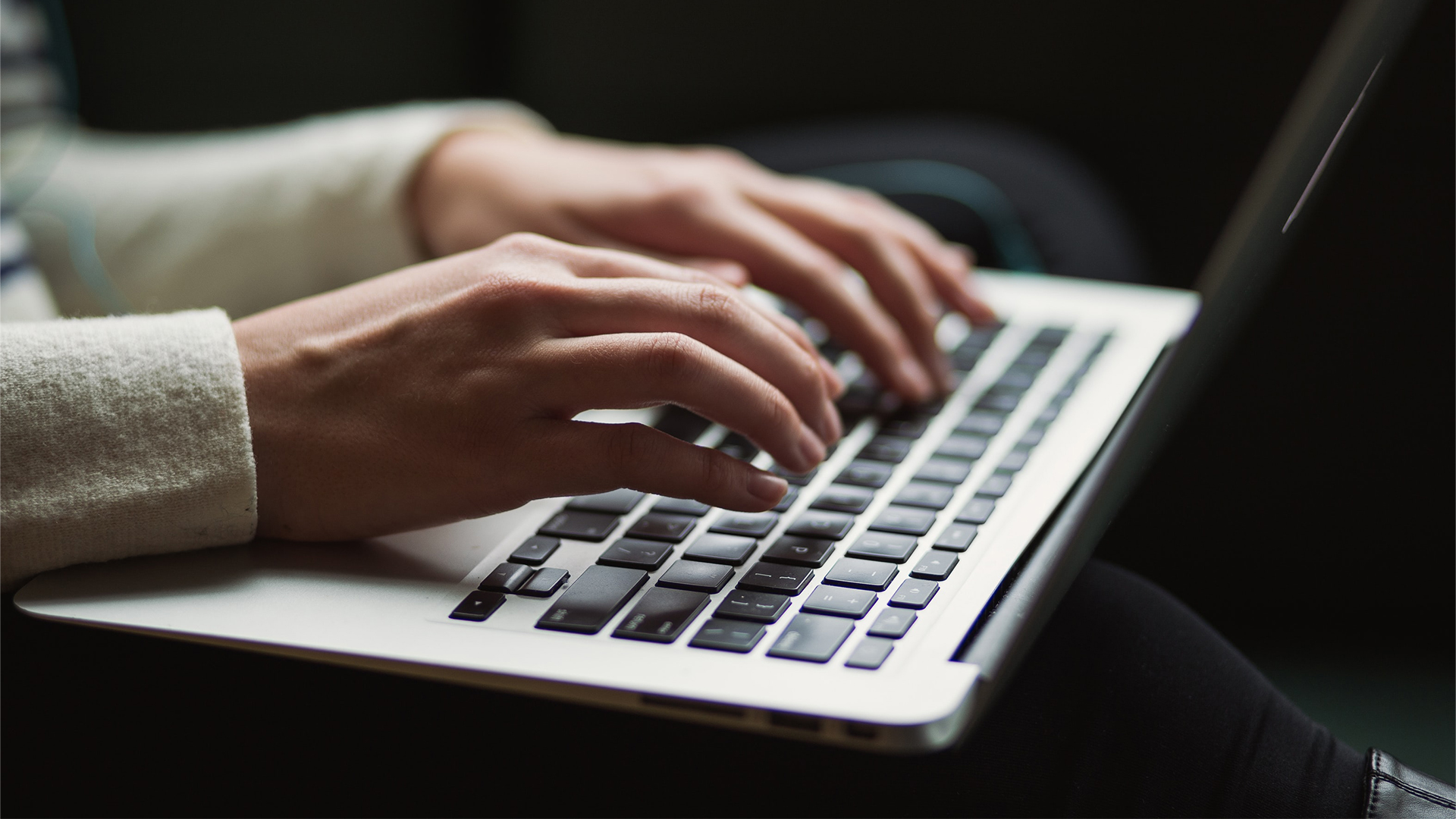 Hands Typing on a Laptop, Representing Final Draft's Full Magento 2 Migration for Improved Ecommerce Security.