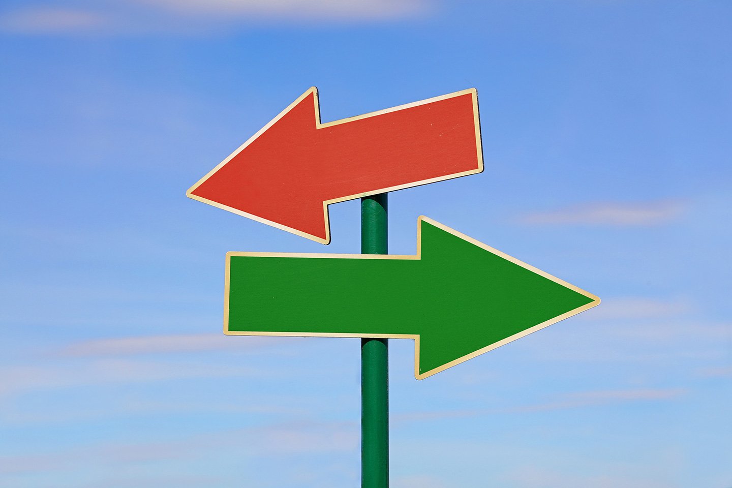 Sign Arrows Pointing in Opposite Directions to Symbolize the Choice of Adobe Commerce As Cloud Service Vs Salesforce Commerce Cloud