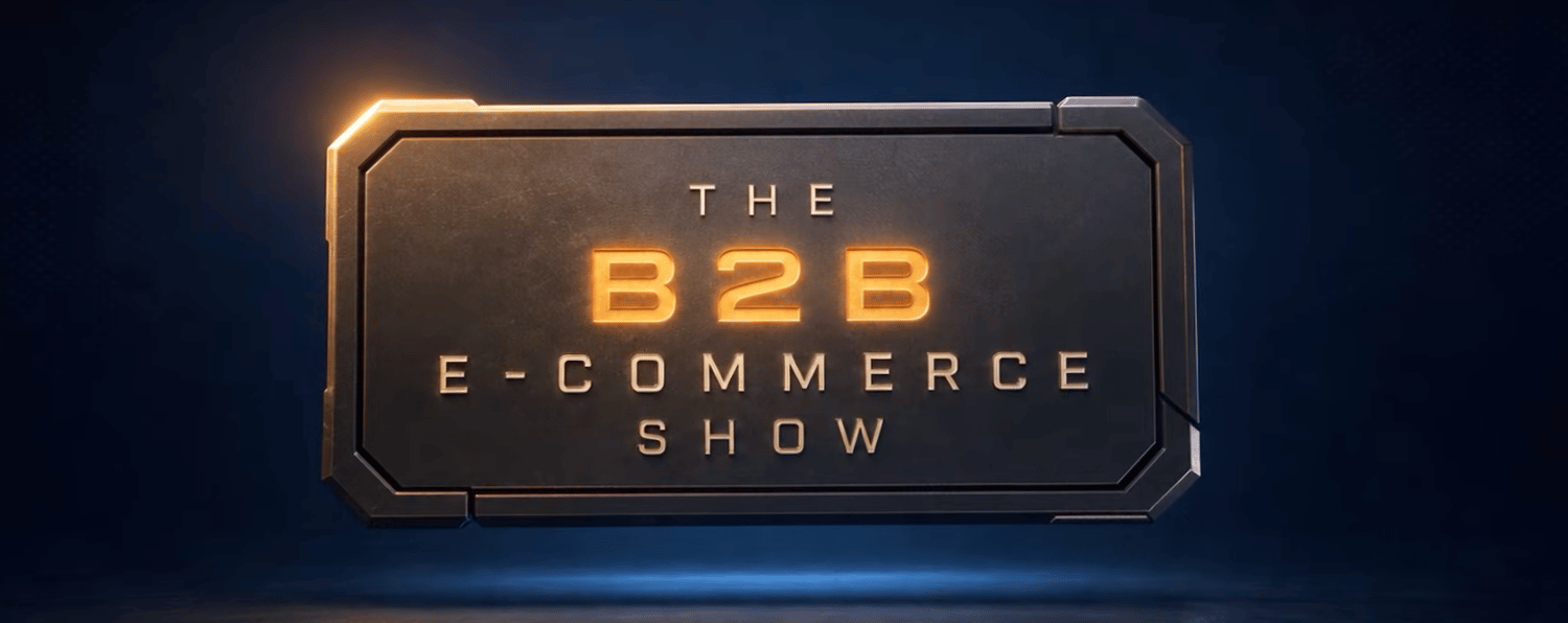 B2becommerceinterview | Atwix Metallic Display Reading 'the B2b E-commerce Show' with Glowing Orange Letters Against a Dark Blue Background.
